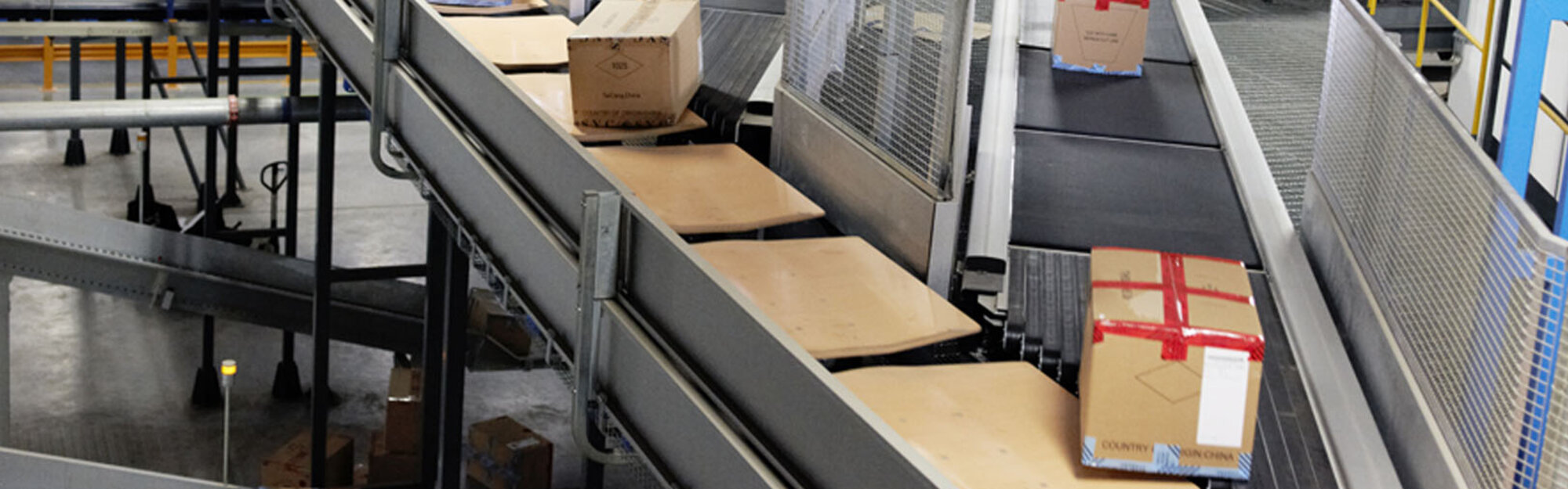 Catchweighing solution supplied to NIKE China using Eilersen load cells and instrumentation © Crisplant