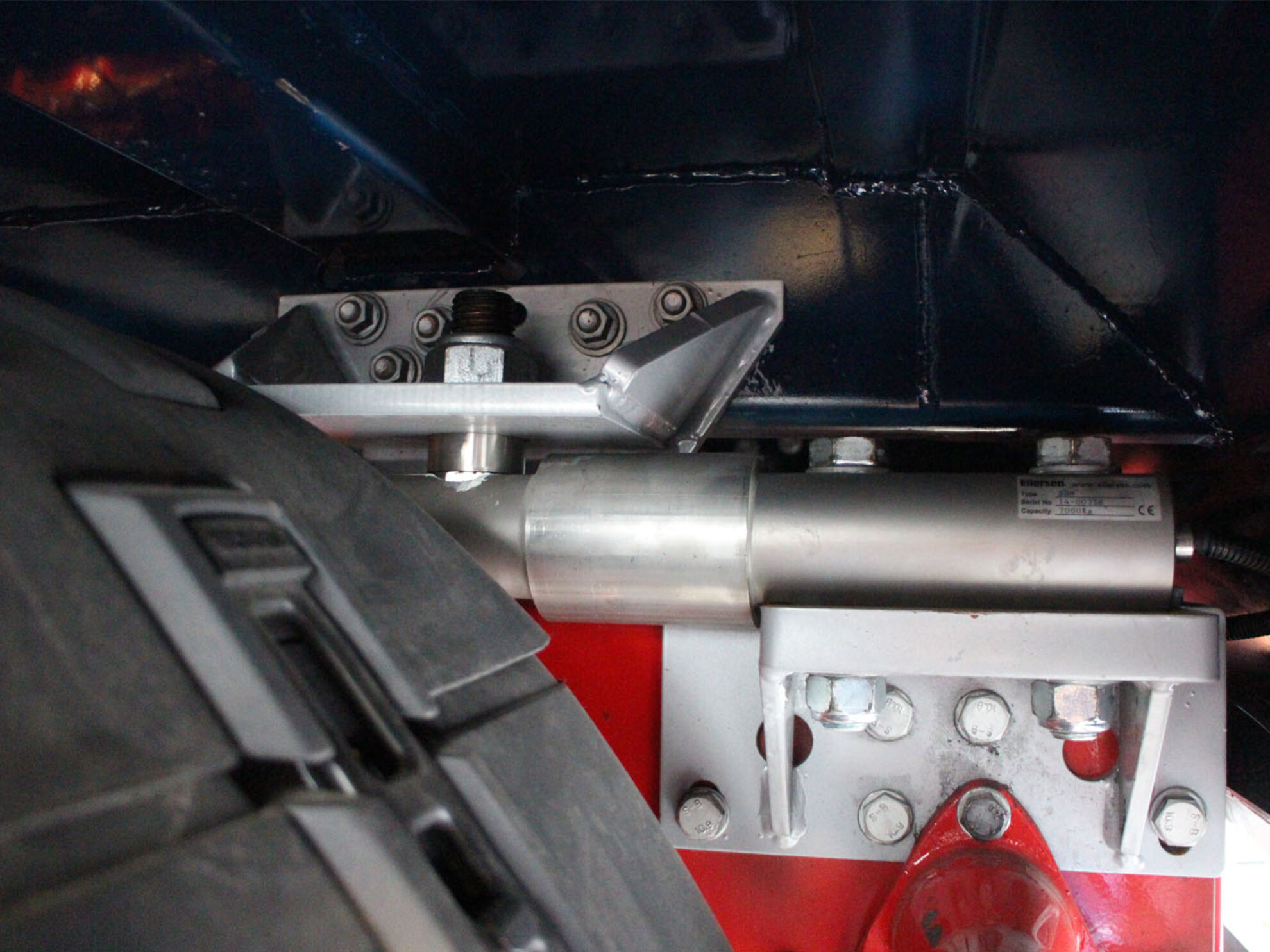 Fixed mounting of Eilersen load cells shown on truck with an Eilersen chassis mounted weighing system